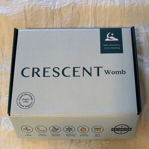 Crescent Womb Baby Sleeper